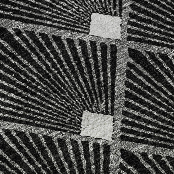 HomeRoots 8' Black and Ivory Abstract Geometric Round Rug - Washable, UV Protected, Durable for High-Traffic Areas 672662