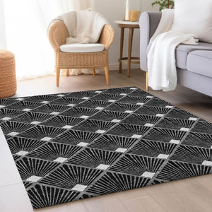 HomeRoots 9' X 12' Black And Ivory Abstract Geometric Washable Area Rug - Stylish, Durable, UV Protected Design 672664
