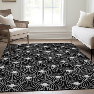 HomeRoots 10' X 14' Black And Ivory Abstract Geometric Area Rug - Durable, Washable, UV-Protected Design for Modern Homes 672665
