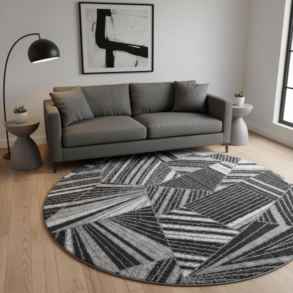 HomeRoots 8' Stylish Black and Gray Geometric Washable Round Rug with UV Protection for Modern Spaces 672734