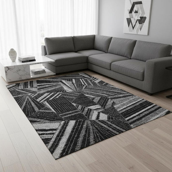 HomeRoots 9' X 12' Modern Black and Gray Geometric Washable Area Rug with UV Protection for Active Homes 672736
