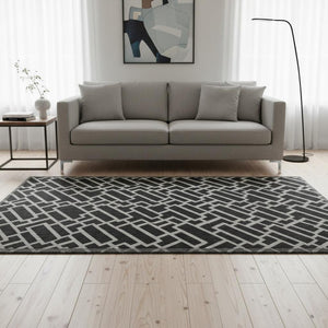 HomeRoots 5' X 8' Black And Ivory Geometric Area Rug - Stylish, Washable, UV Protected for Busy Homes 672811