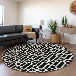 HomeRoots 8' Black And Ivory Geometric Round Rug - Washable, UV Protected, Durable, Modern Design for Any Space 672812