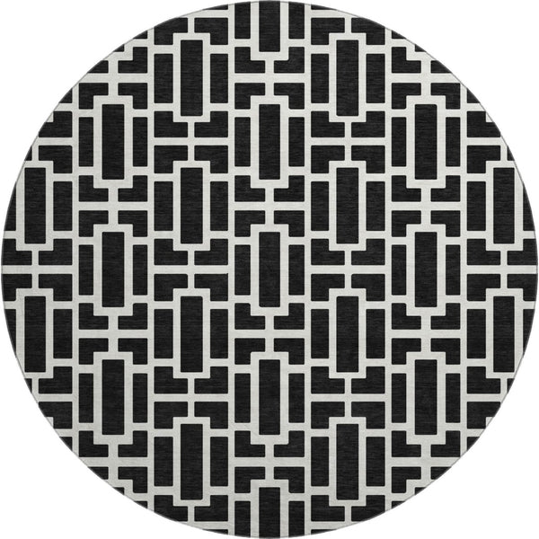 HomeRoots 8' Black And Ivory Geometric Round Rug - Washable, UV Protected, Durable, Modern Design for Any Space 672812