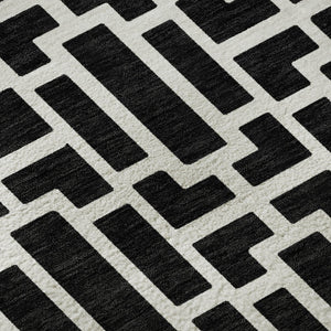 HomeRoots 8' Black And Ivory Geometric Round Rug - Washable, UV Protected, Durable, Modern Design for Any Space 672812