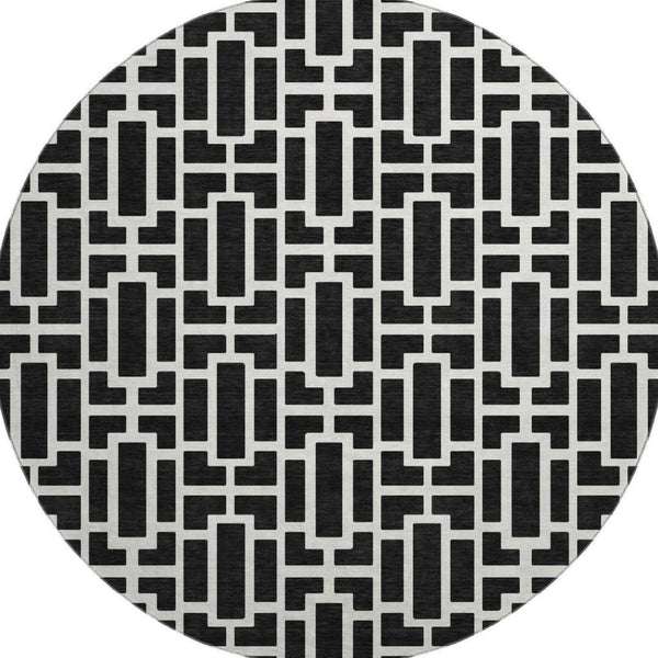 HomeRoots 8' Black And Ivory Geometric Round Rug - Washable, UV Protected, Durable, Modern Design for Any Space 672812