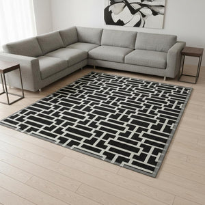 HomeRoots 8' X 10' Black and Ivory Geometric Area Rug - Stylish, Washable, UV-Protected for Modern Homes 672813