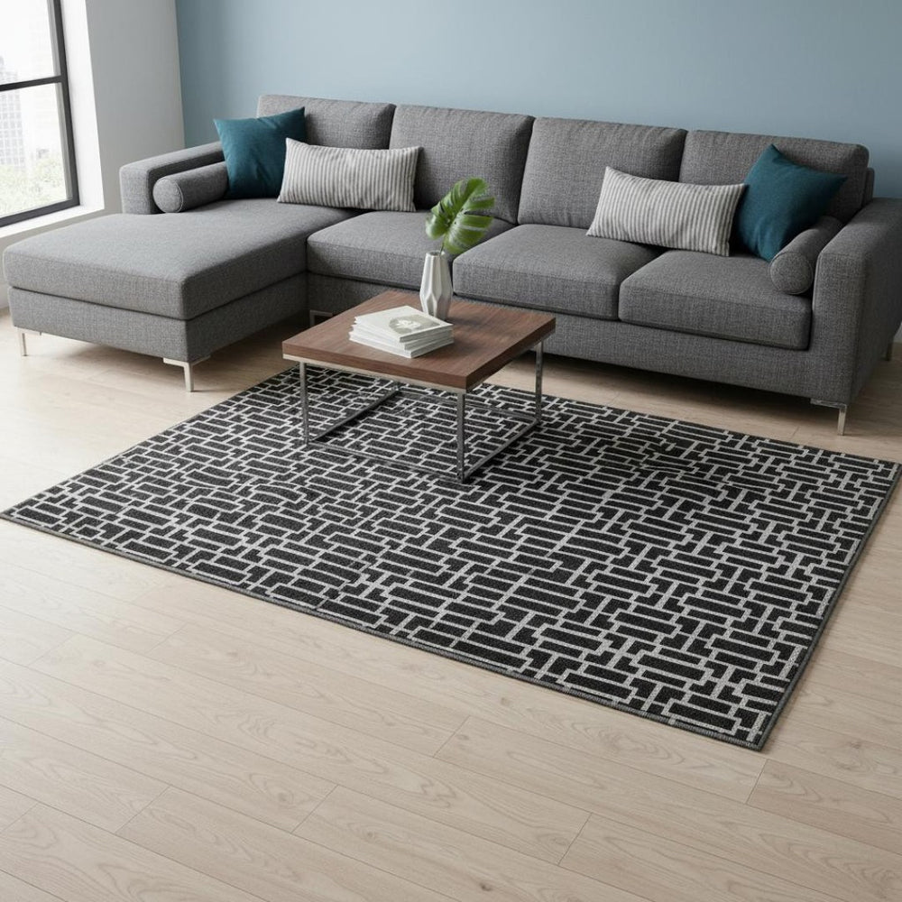 HomeRoots 9' X 12' Black and Ivory Geometric Area Rug - Modern, Washable, UV-Protected, Family-Friendly Design! 672814