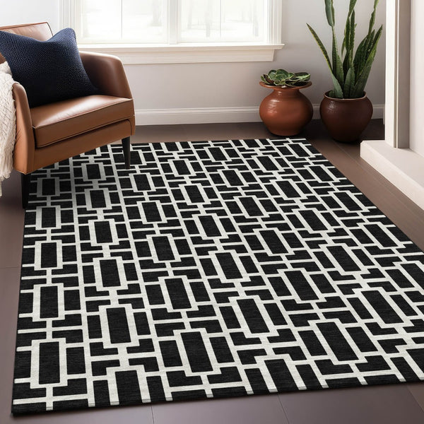 HomeRoots 9' X 12' Black and Ivory Geometric Area Rug - Modern, Washable, UV-Protected, Family-Friendly Design! 672814