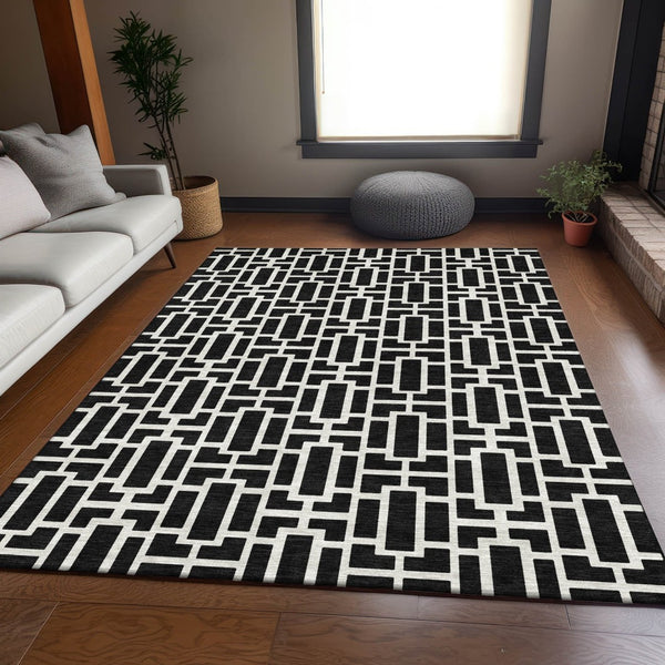 HomeRoots 9' X 12' Black and Ivory Geometric Area Rug - Modern, Washable, UV-Protected, Family-Friendly Design! 672814