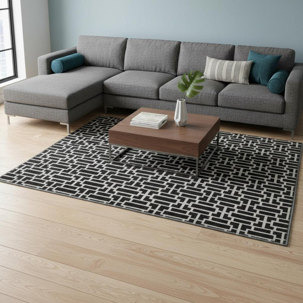 HomeRoots 10' X 14' Black And Ivory Geometric Area Rug - Washable, UV Protected, Perfect for High Traffic Homes! 672815