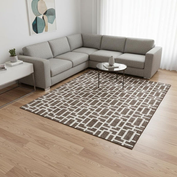 HomeRoots 9' X 12' Brown and Ivory Geometric Area Rug - Washable, UV Protected, Perfect for High-Traffic Spaces! 672820