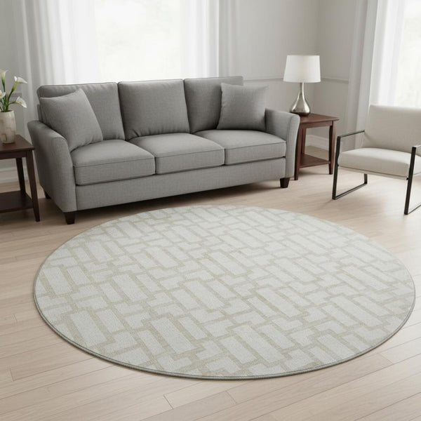 HomeRoots 8' Ivory and Beige Geometric Round Rug - Washable, UV Protected, Perfect for High-Traffic Areas 672830