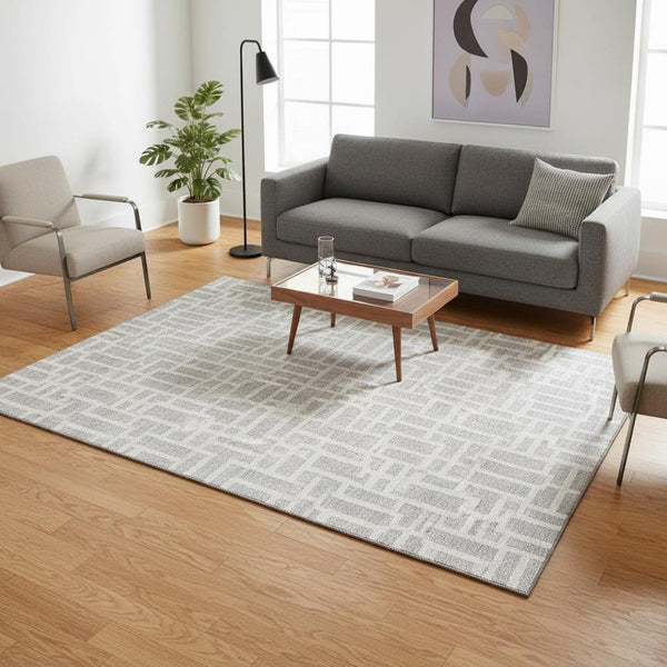 HomeRoots 5' X 8' Silver And Ivory Geometric Area Rug - Stylish, Washable & UV-Protected for Modern Spaces 672847