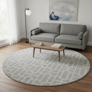 HomeRoots 8' Silver and Ivory Geometric Round Rug - Washable, UV Protected, Perfect for High-Traffic Areas! 672848