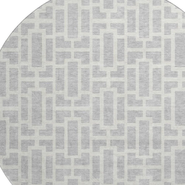 HomeRoots 8' Silver and Ivory Geometric Round Rug - Washable, UV Protected, Perfect for High-Traffic Areas! 672848