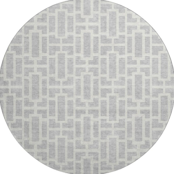 HomeRoots 8' Silver and Ivory Geometric Round Rug - Washable, UV Protected, Perfect for High-Traffic Areas! 672848