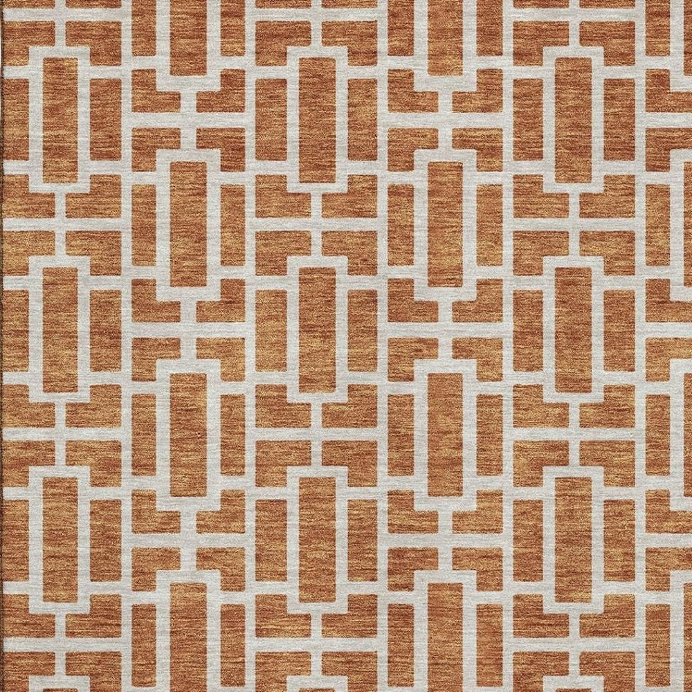 HomeRoots 5' X 8' Terra Cotta and Beige Geometric Washable Area Rug with UV Protection for Modern Living Spaces 672853