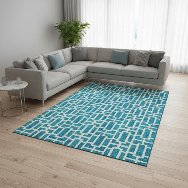 HomeRoots 9' X 12' Turquoise and Ivory Geometric Area Rug – Stylish, Washable, UV-Protected for High-Traffic Spaces 672862