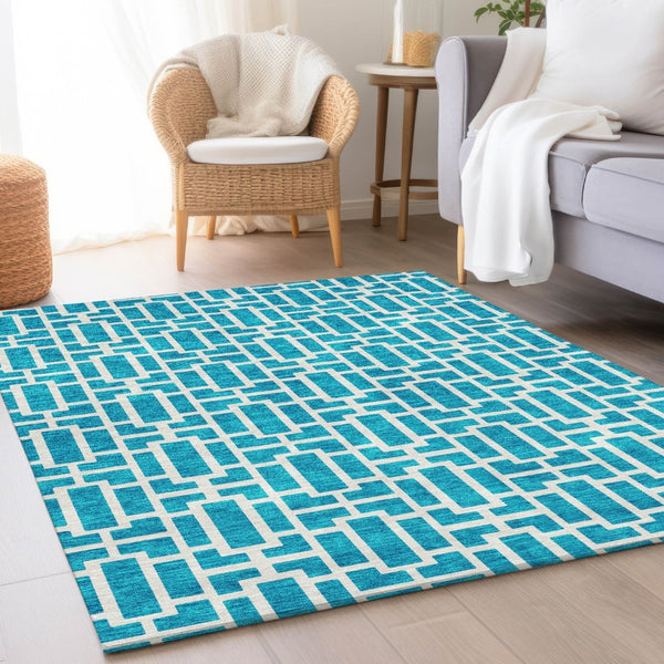HomeRoots 9' X 12' Turquoise and Ivory Geometric Area Rug – Stylish, Washable, UV-Protected for High-Traffic Spaces 672862