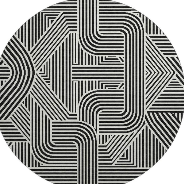 HomeRoots 8' Black And Ivory Abstract Geometric Round Rug – Durable, Washable, UV-Protected for Modern Homes 672884