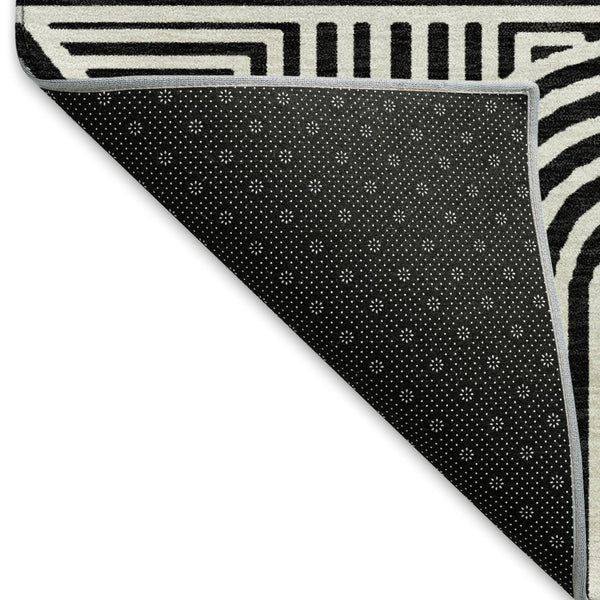 HomeRoots 8' X 10' Black And Ivory Abstract Geometric Area Rug - Washable, UV Protected & Ideal for High-Traffic Spaces 672885