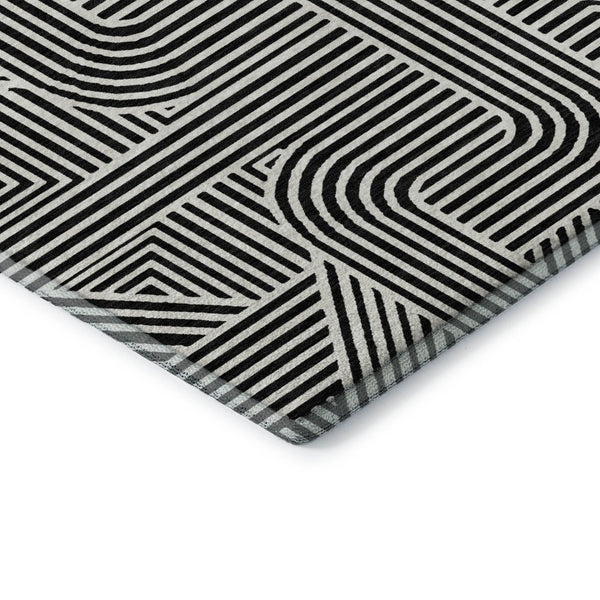 HomeRoots 8' X 10' Black And Ivory Abstract Geometric Area Rug - Washable, UV Protected & Ideal for High-Traffic Spaces 672885
