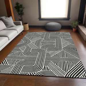HomeRoots 8' X 10' Black And Ivory Abstract Geometric Area Rug - Washable, UV Protected & Ideal for High-Traffic Spaces 672885
