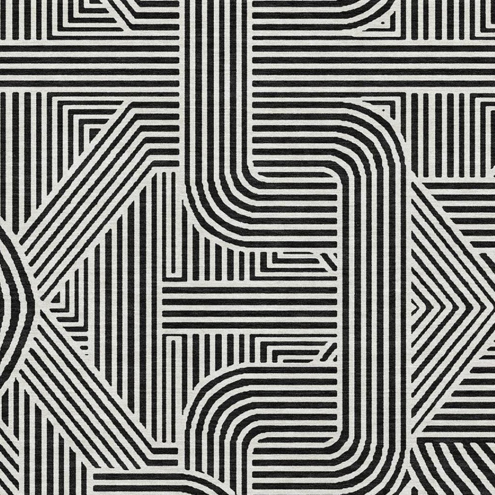 HomeRoots 8' X 10' Black And Ivory Abstract Geometric Area Rug - Washable, UV Protected & Ideal for High-Traffic Spaces 672885