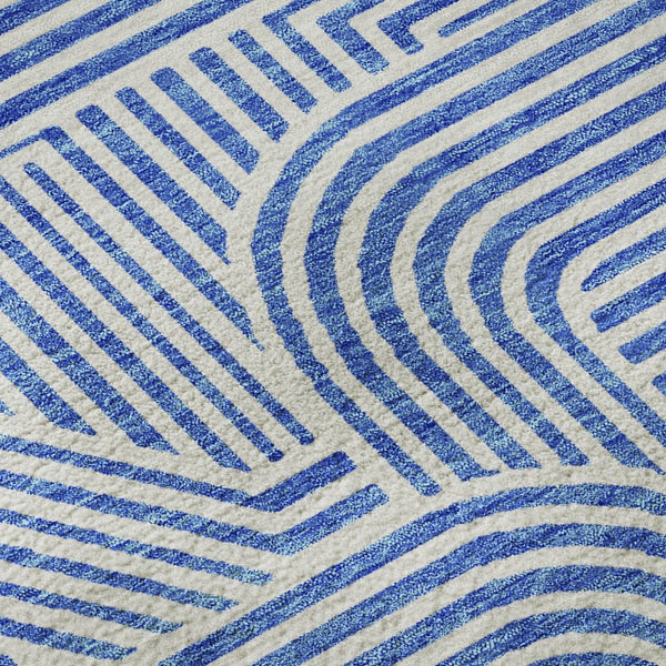 HomeRoots 8' Washable Round Rug in Blue and Ivory - Modern Abstract Design with UV Protection for Easy Care 672890