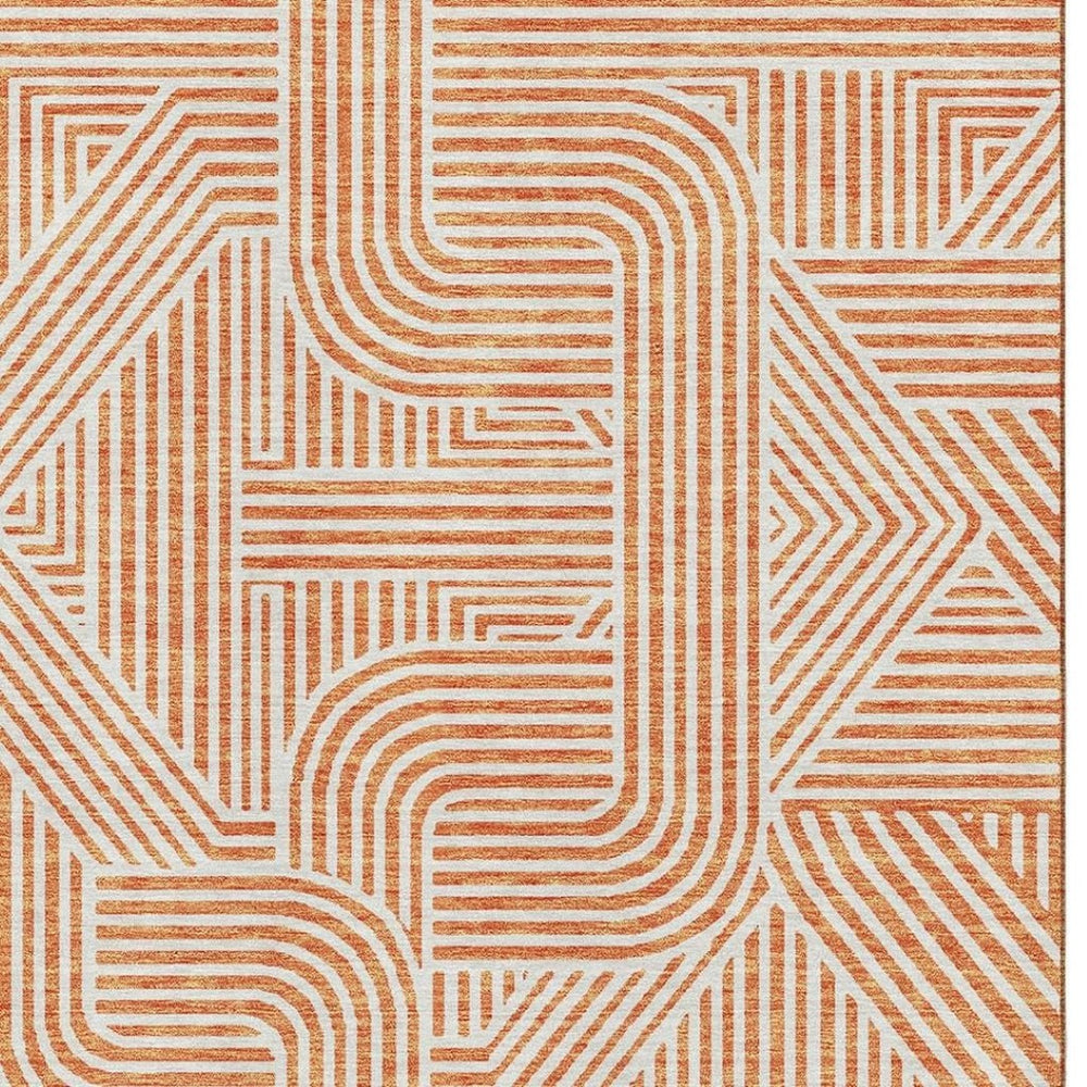 HomeRoots 10' X 14' Washable Orange and Ivory Geometric Area Rug with UV Protection for Modern Spaces 672929