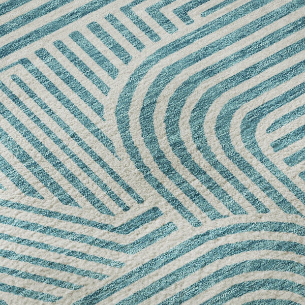 HomeRoots 8' Teal and Ivory Abstract Geometric Round Rug - Durable, Washable, UV-Protected for High-Traffic Areas 672938