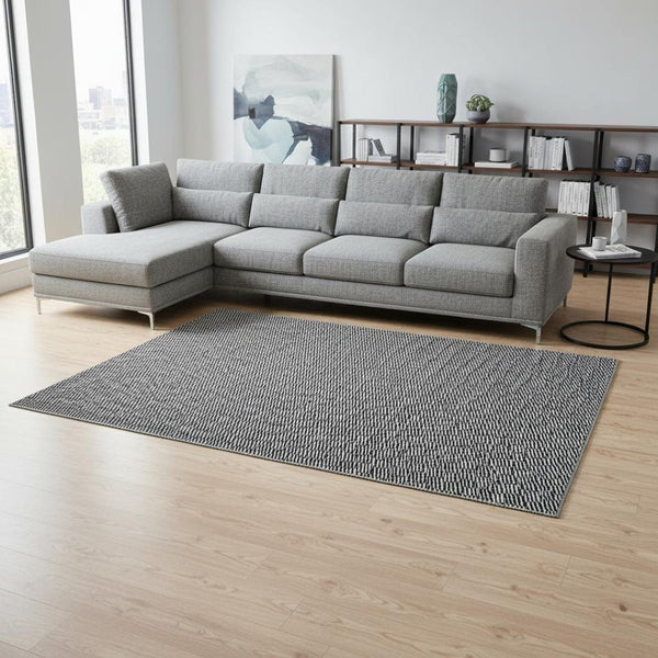 HomeRoots 10' X 14' Abstract Geometric Area Rug - Black & Gray, Washable, UV Protected for Modern Spaces 672959