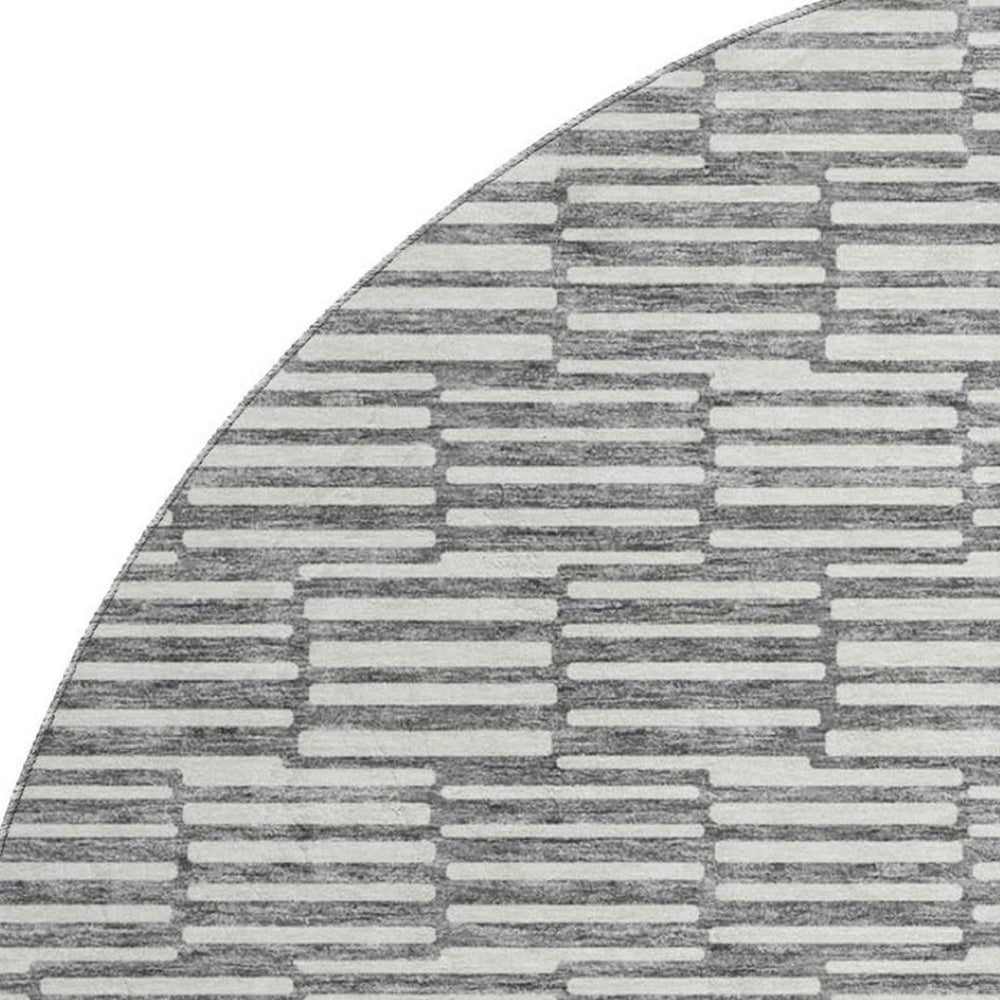 HomeRoots 8' Gray And Ivory Abstract Geometric Round Rug - Washable, UV-Protected, Durable, Modern Accent Piece 672974