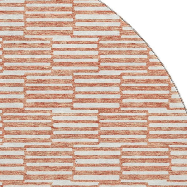 HomeRoots 8' Salmon and Beige Abstract Geometric Round Rug – Washable, UV Protected, Perfect for High-Traffic Areas 673010