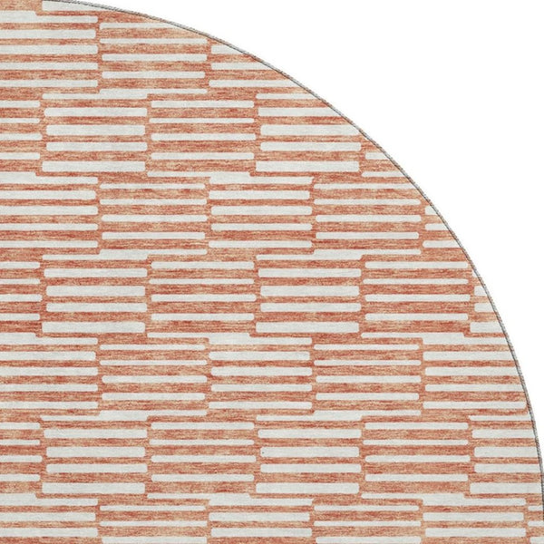 HomeRoots 8' Salmon and Beige Abstract Geometric Round Rug – Washable, UV Protected, Perfect for High-Traffic Areas 673010