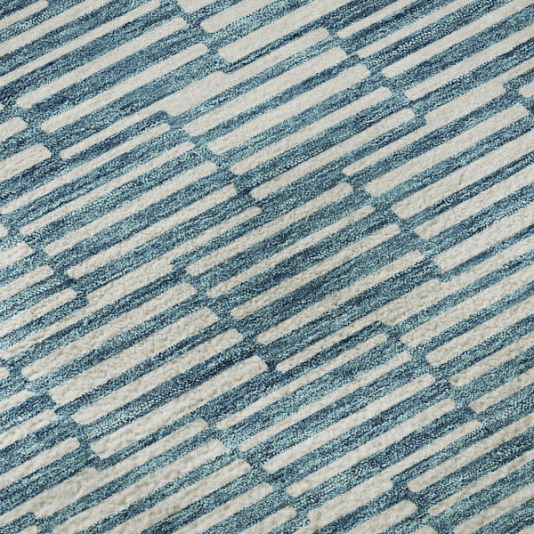 HomeRoots 8' Teal and Beige Geometric Round Rug - Washable, UV Protected, Stylish, and Durable for Any Space! 673016