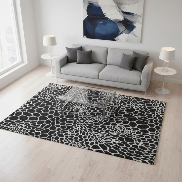 HomeRoots 5' X 8' Modern Black and Ivory Geometric Area Rug – Washable, Stain-Resistant, UV Protected Design 673033