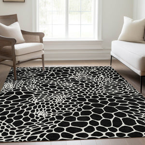 HomeRoots 5' X 8' Modern Black and Ivory Geometric Area Rug – Washable, Stain-Resistant, UV Protected Design 673033