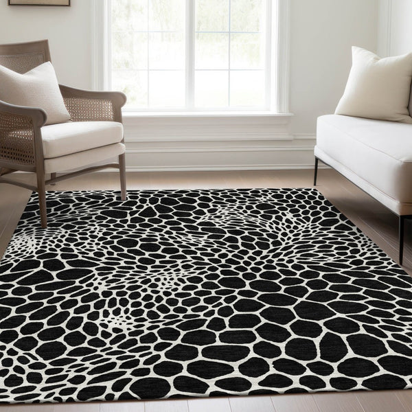 HomeRoots 5' X 8' Modern Black and Ivory Geometric Area Rug – Washable, Stain-Resistant, UV Protected Design 673033
