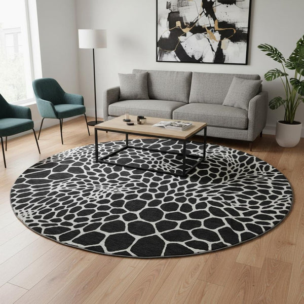 HomeRoots 8' Black and Ivory Geometric Round Rug - Washable, UV-Protected, Durable for Homes with Kids & Pets 673034