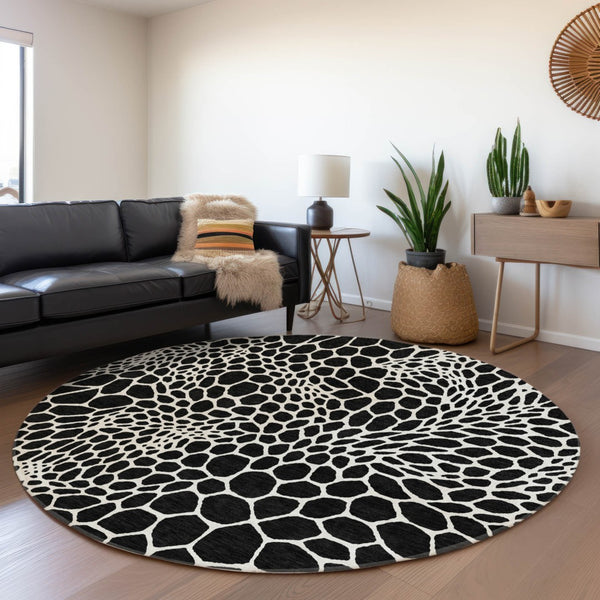 HomeRoots 8' Black and Ivory Geometric Round Rug - Washable, UV-Protected, Durable for Homes with Kids & Pets 673034