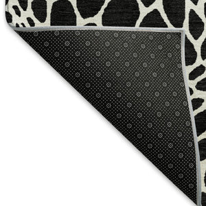 HomeRoots 8' Black and Ivory Geometric Round Rug - Washable, UV-Protected, Durable for Homes with Kids & Pets 673034