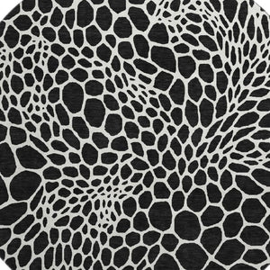HomeRoots 8' Black and Ivory Geometric Round Rug - Washable, UV-Protected, Durable for Homes with Kids & Pets 673034