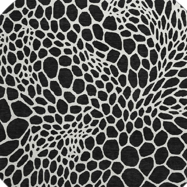 HomeRoots 8' Black and Ivory Geometric Round Rug - Washable, UV-Protected, Durable for Homes with Kids & Pets 673034