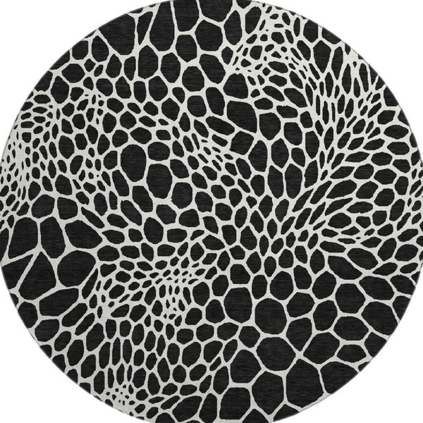 HomeRoots 8' Black and Ivory Geometric Round Rug - Washable, UV-Protected, Durable for Homes with Kids & Pets 673034