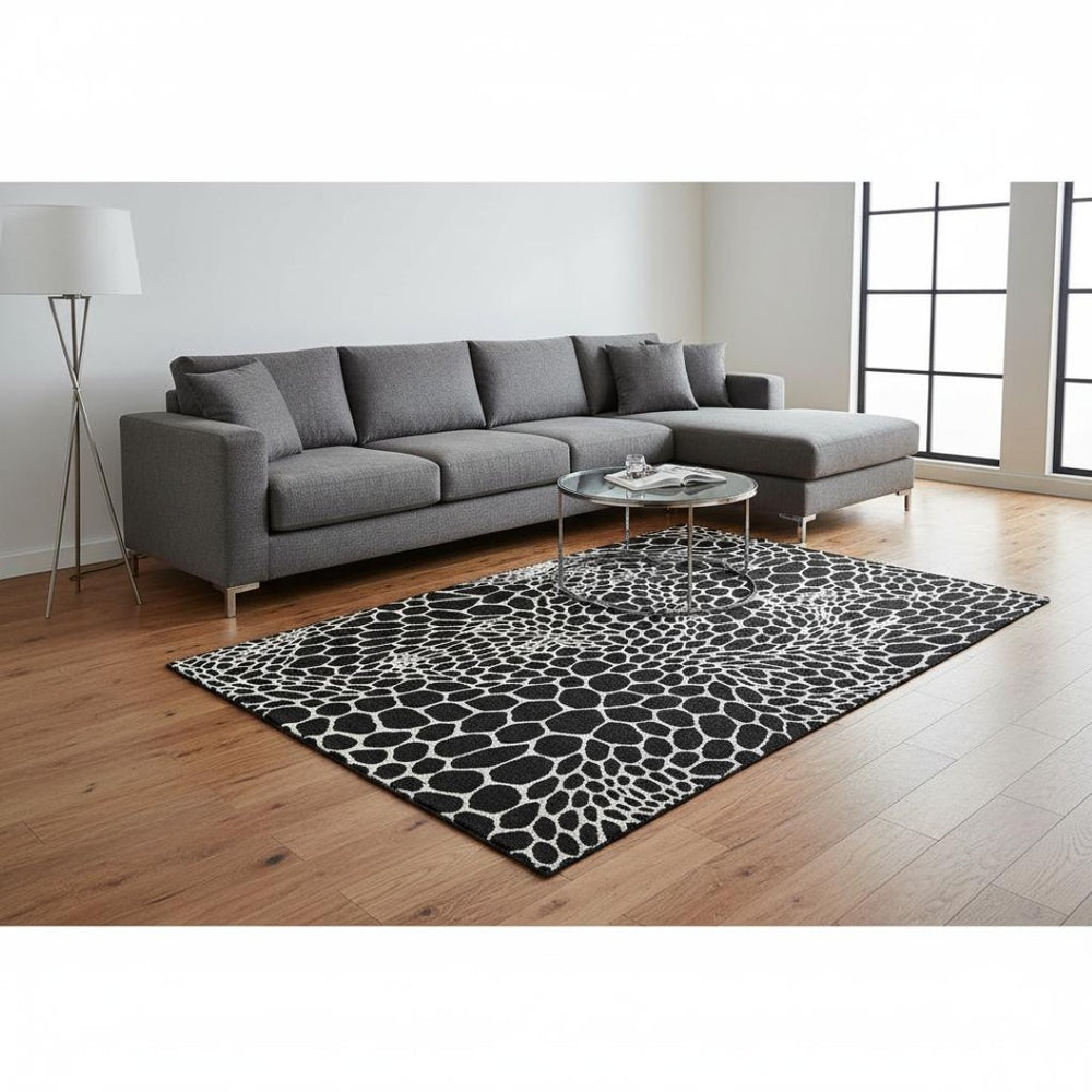 HomeRoots 9' X 12' Stylish Black and Ivory Geometric Area Rug - Washable, UV-Protected, Perfect for Families! 673036