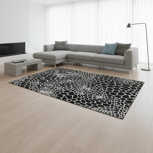 HomeRoots 10' Modern Black and Ivory Geometric Washable Area Rug - Durable, UV-Protected, Family-Friendly Design 673037