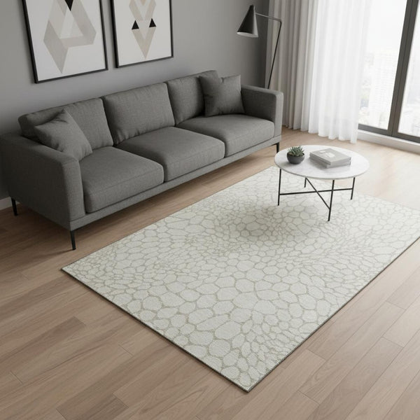 HomeRoots 5' X 8' Ivory and Beige Geometric Area Rug - Washable, UV Protected, Stain Resistant for Family Spaces 673057