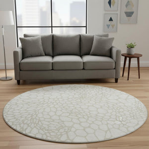 HomeRoots 8' Ivory and Beige Geometric Round Rug - Washable, UV-Protected, Stylish & Durable for High Traffic Areas 673058